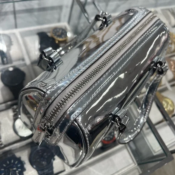 MICHAEL KORS Jet Set Small Patent Duffel Xbody Crossbody Bag
Silver 
NWT - Picture 14 of 16